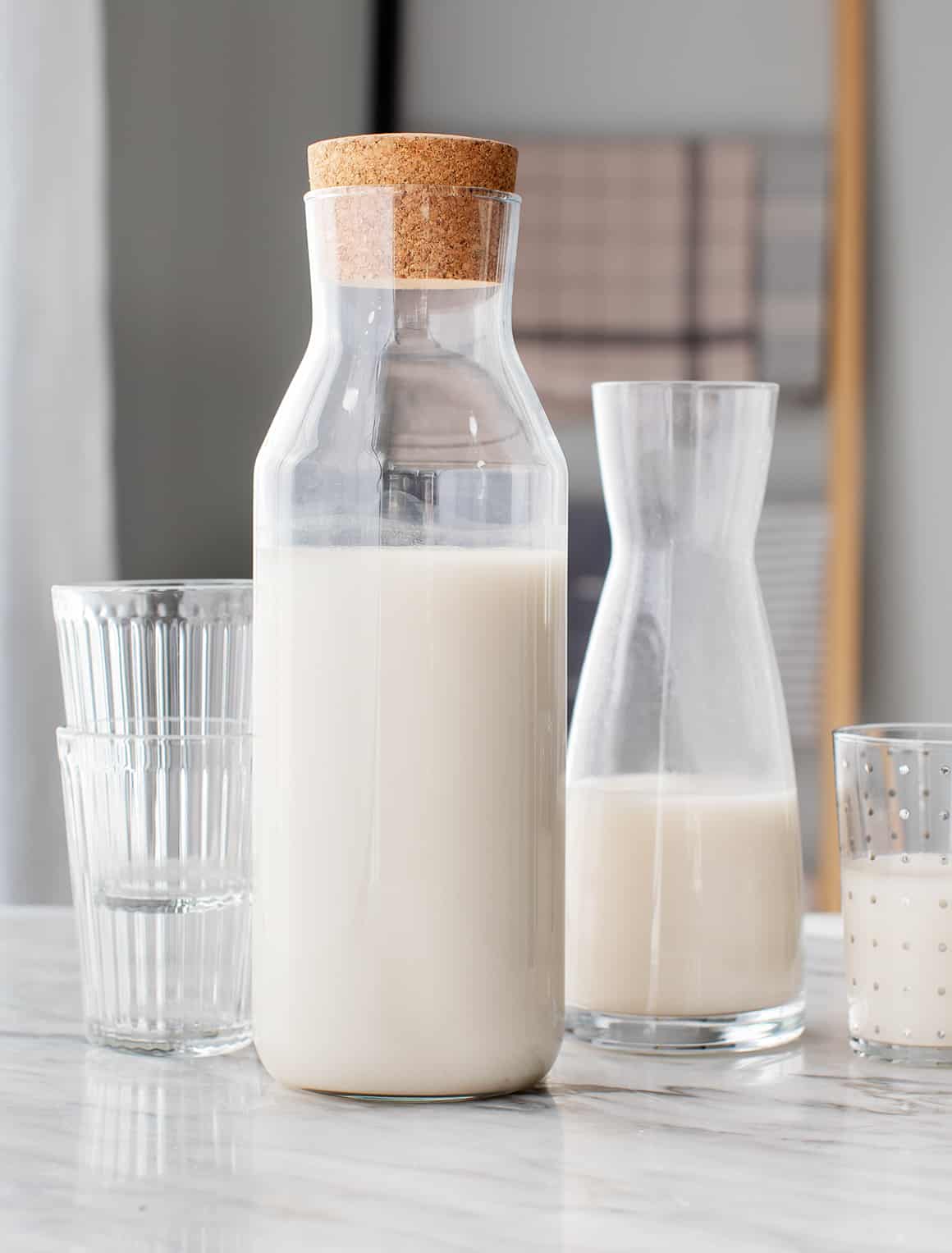 Oat milk in reusable glass container