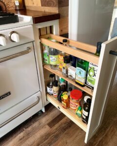 Custom skoolie kitchen organization